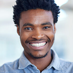 Happy man with bright healthy smile